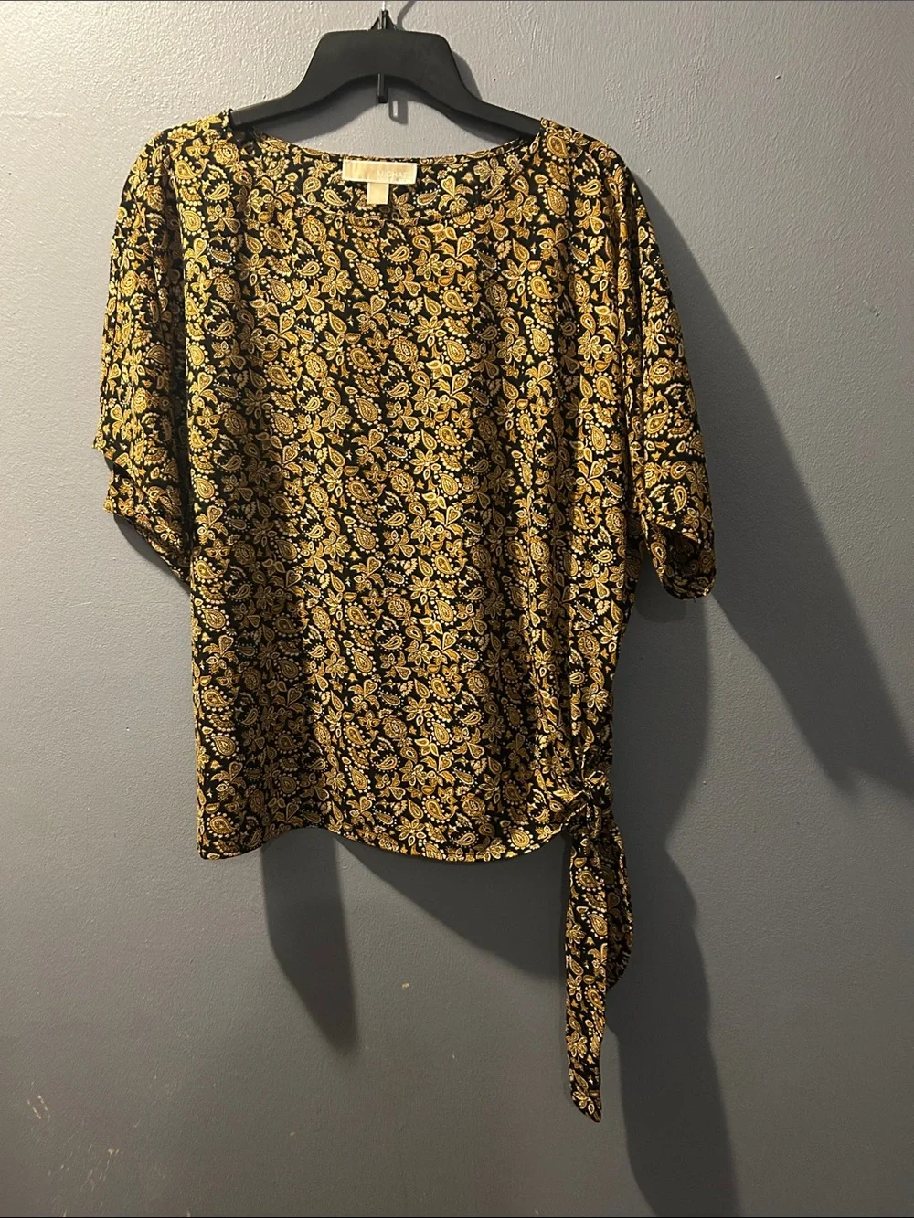 Michael Kors Black Top with Gold Floral Print and Side Tie